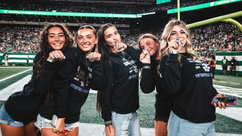 During the New York Jets final exhibition game against the Philadelphia Eagles, the NFL team honored two girls' flag high school football teams that won championships earlier this year.